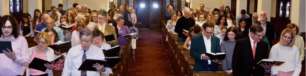 Congregation singing.